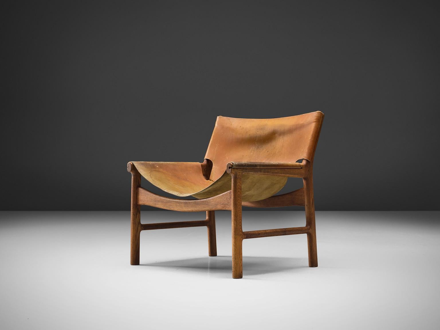 Illum Wikkelso Easy Chair in Oak and Leather