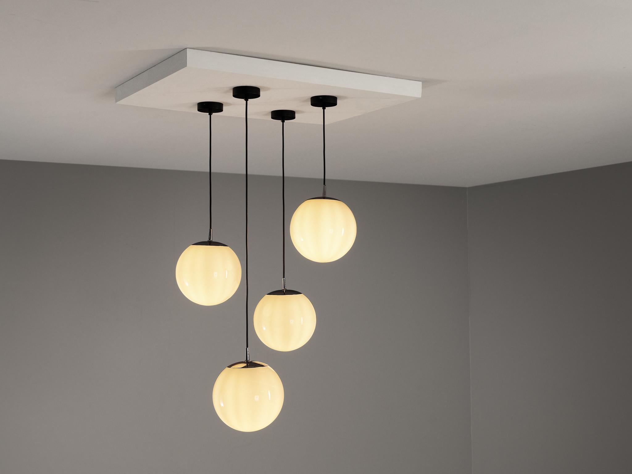 Mid-Century Modern Set of Four Pendants with White Glass Spheres