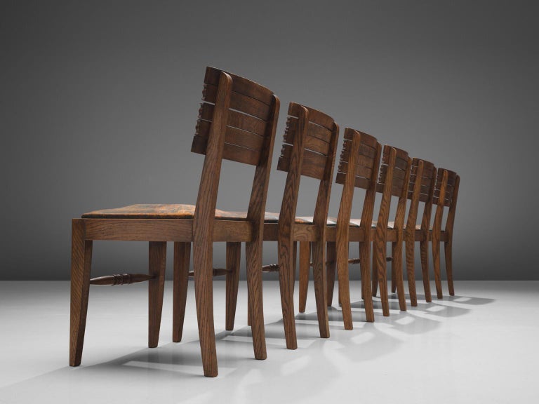 Gaston Poisson Set of Six Dining Chairs in Oak and Leather