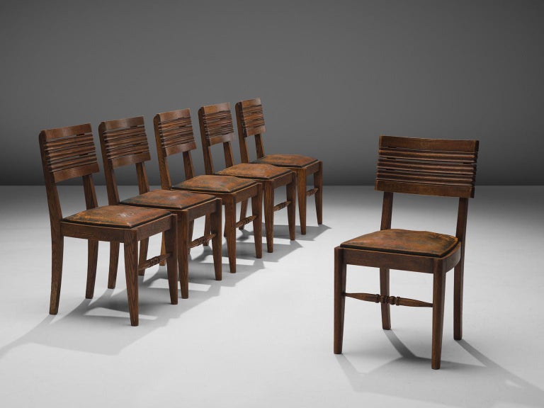 Gaston Poisson Set of Six Dining Chairs in Oak and Leather