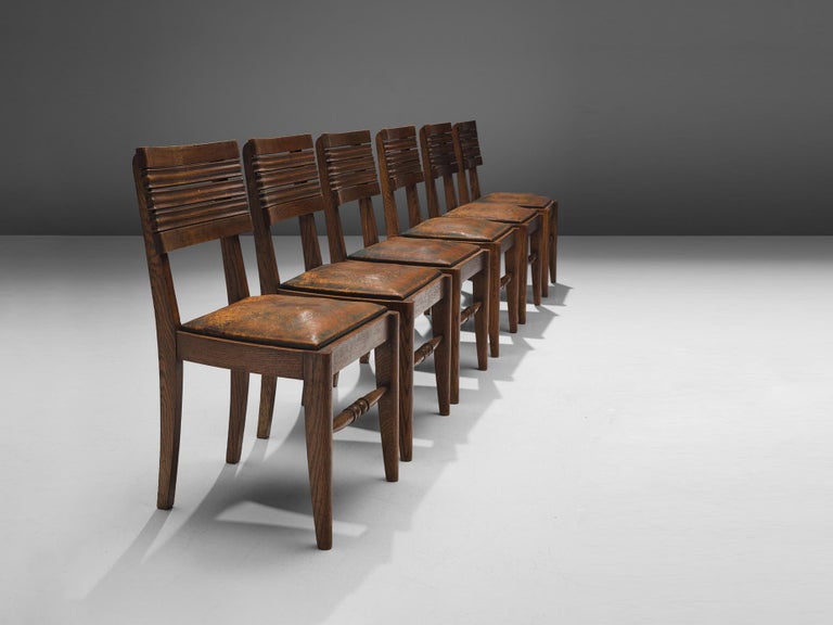 Gaston Poisson Set of Six Dining Chairs in Oak and Leather