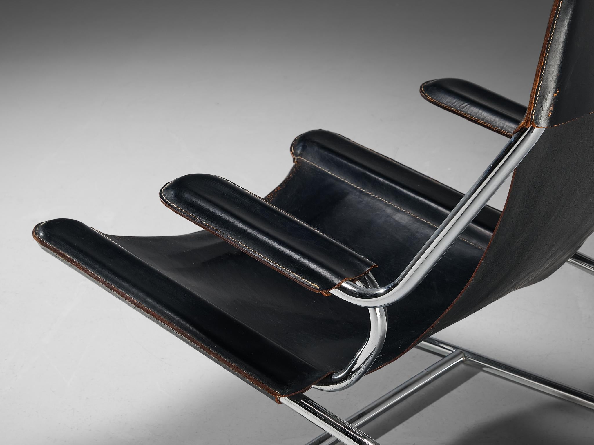 Tubular Lounge Chair and Ottoman in Black Leather