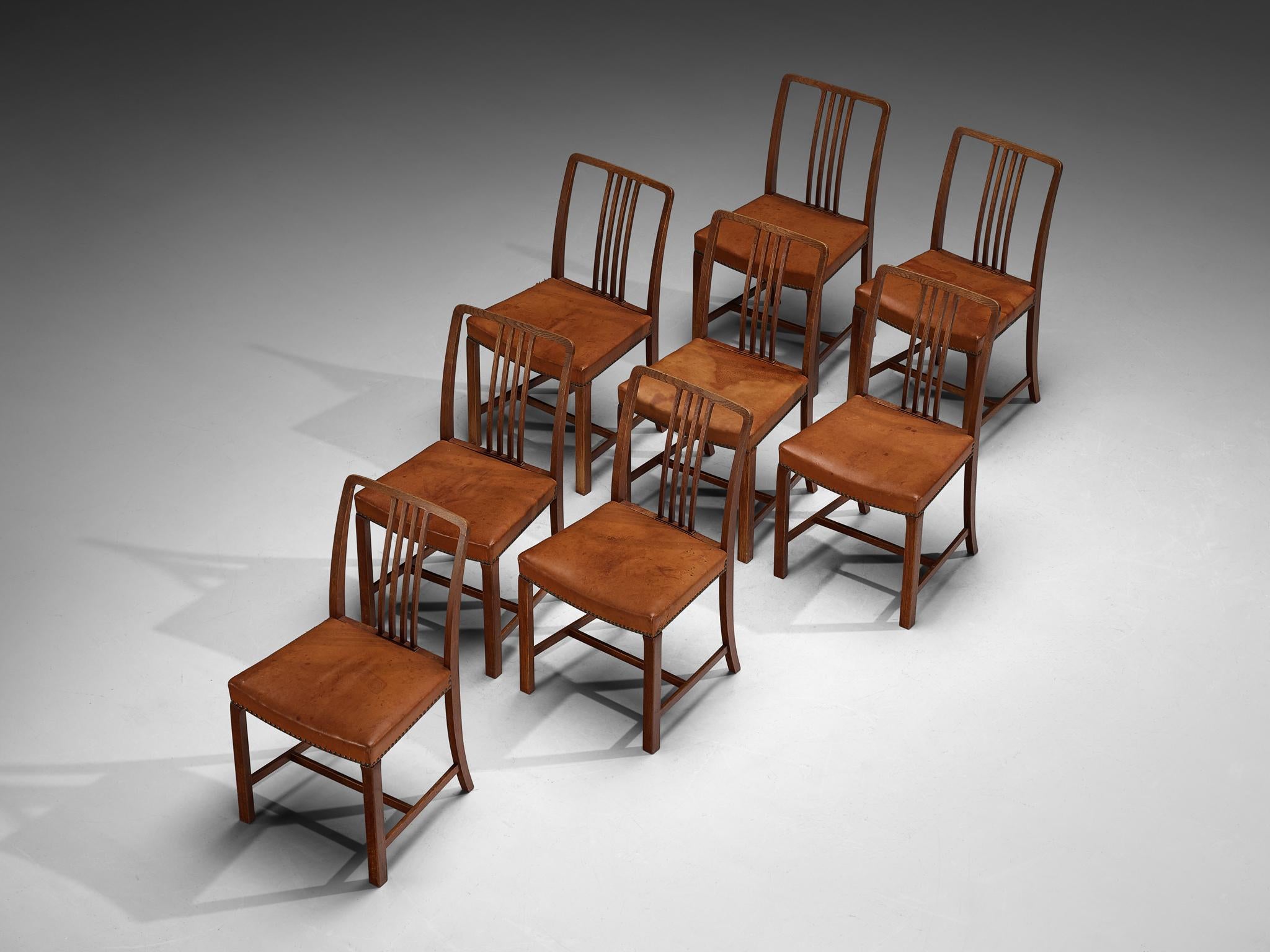 Jørgen Christensens Set of Eight Dining Chairs in Cognac Leather and Oak