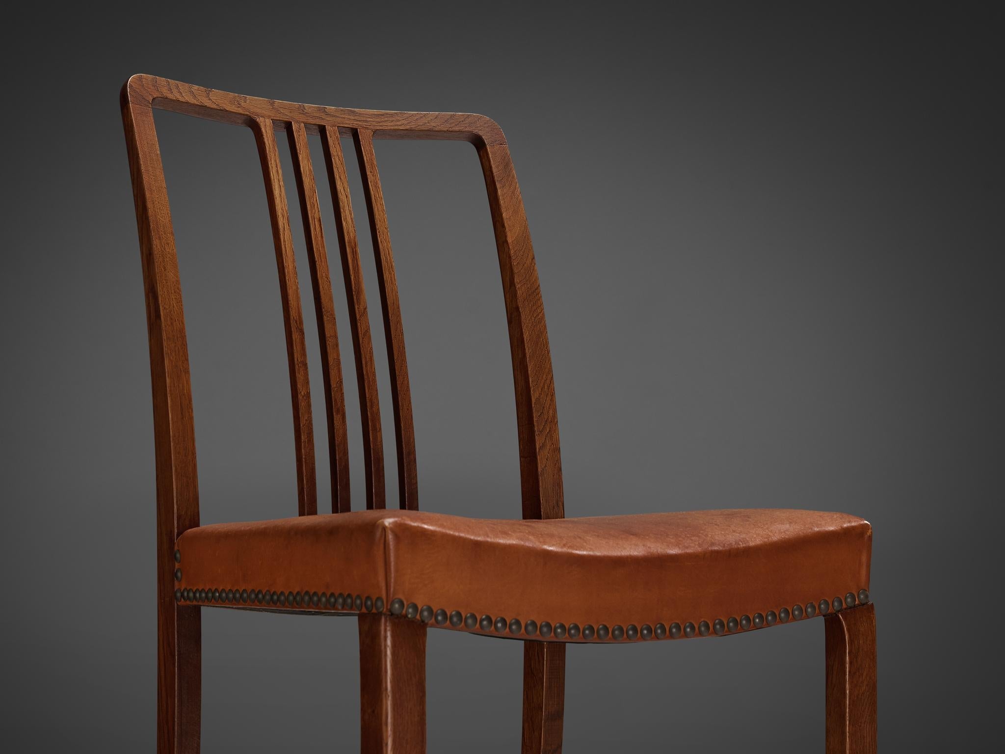 Jørgen Christensens Set of Eight Dining Chairs in Cognac Leather and Oak