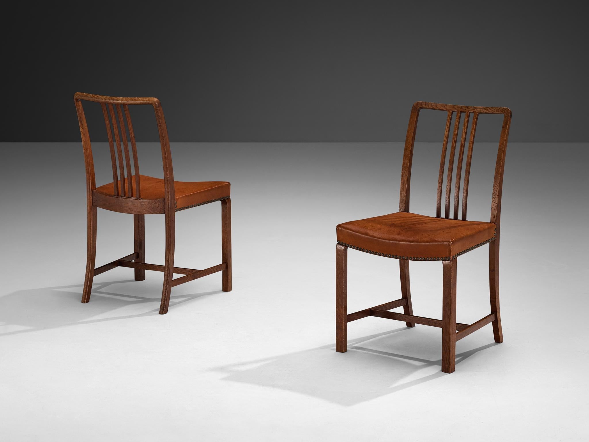 Jørgen Christensens Set of Eight Dining Chairs in Cognac Leather and Oak