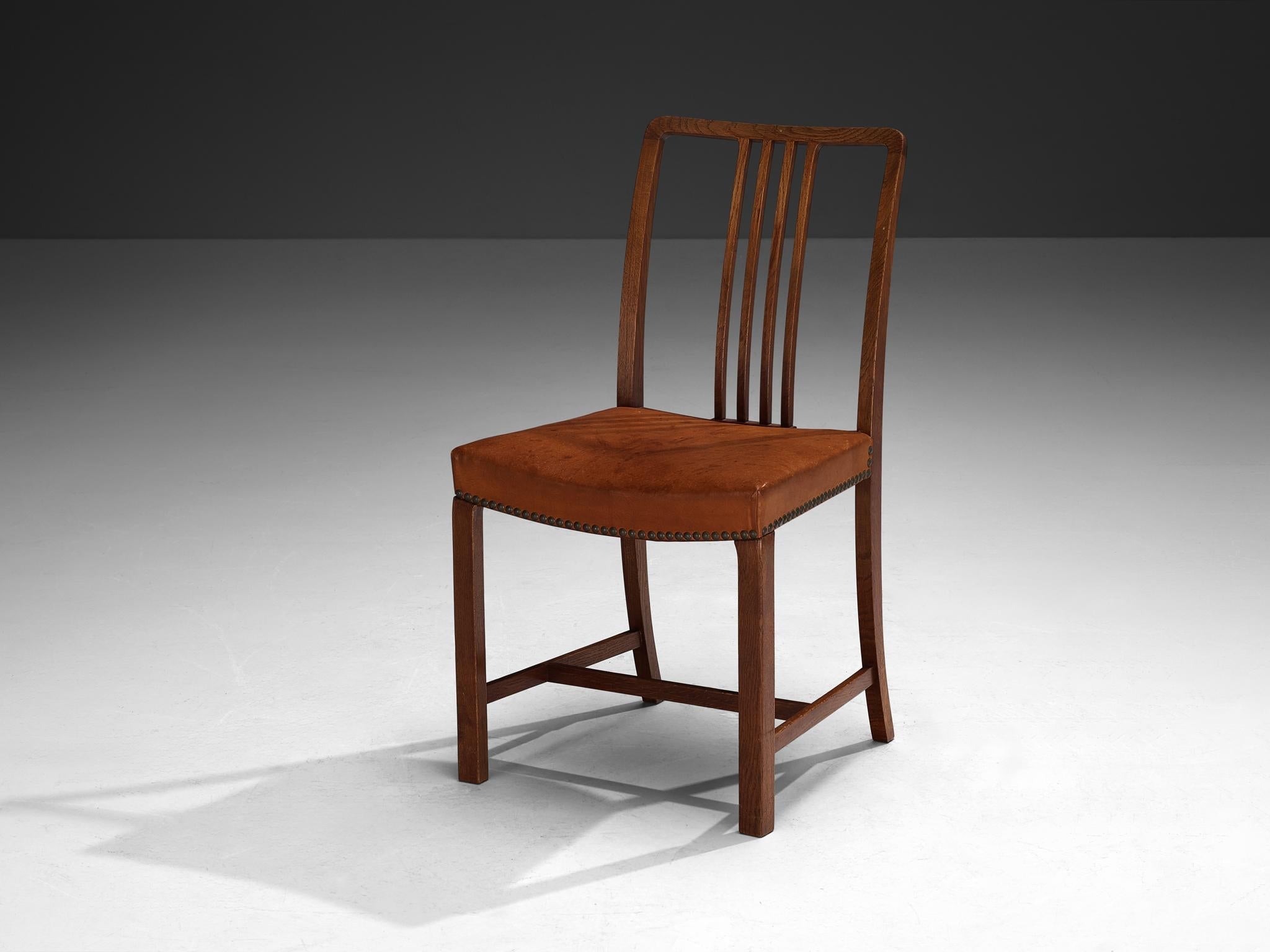 Jørgen Christensens Set of Eight Dining Chairs in Cognac Leather and Oak