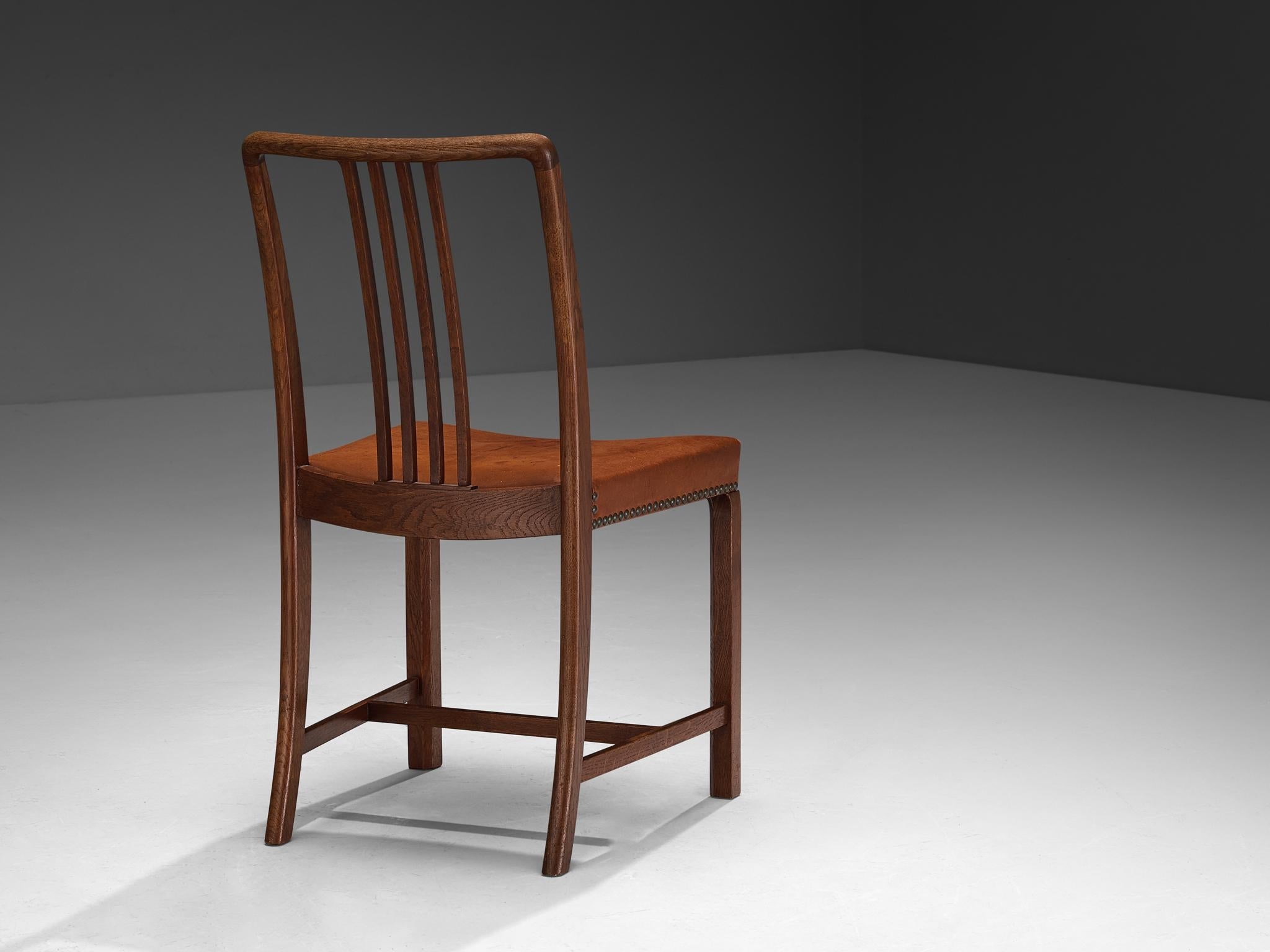 Jørgen Christensens Set of Eight Dining Chairs in Cognac Leather and Oak