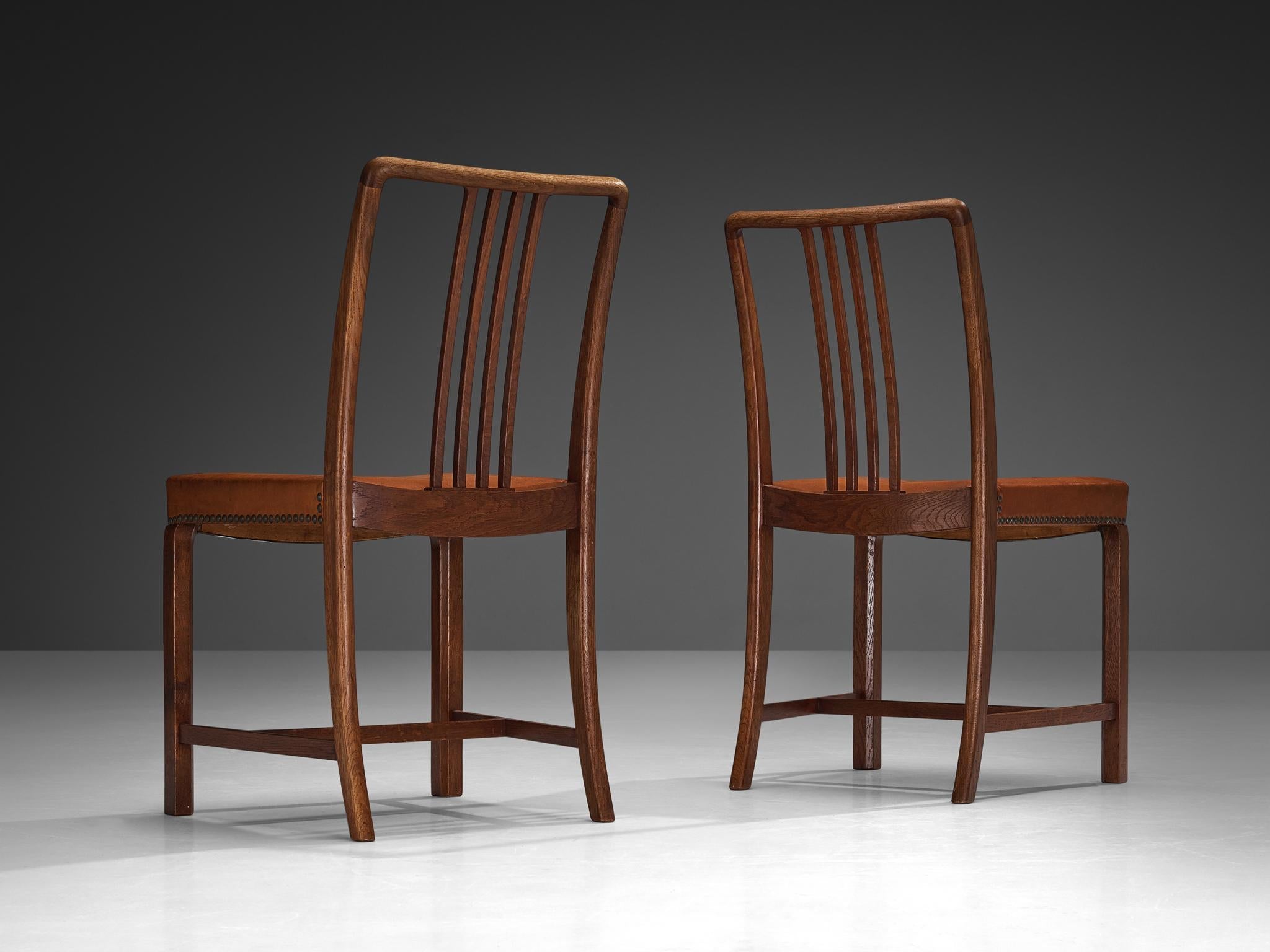 Jørgen Christensens Set of Eight Dining Chairs in Cognac Leather and Oak