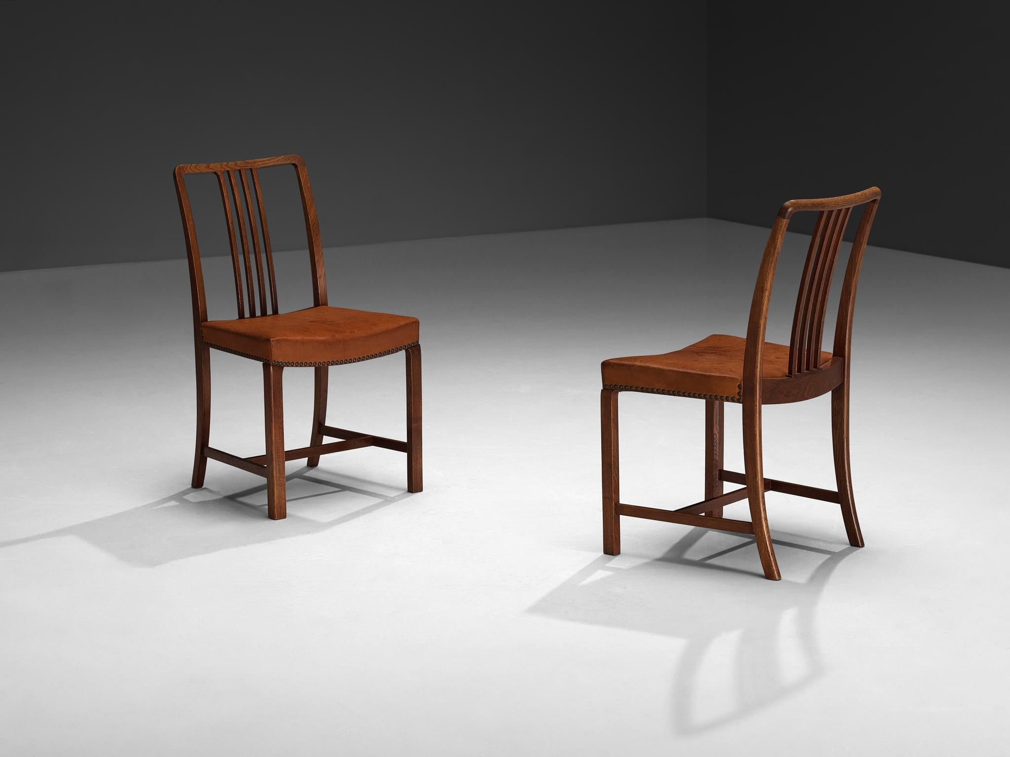 Jørgen Christensens Set of Eight Dining Chairs in Cognac Leather and Oak