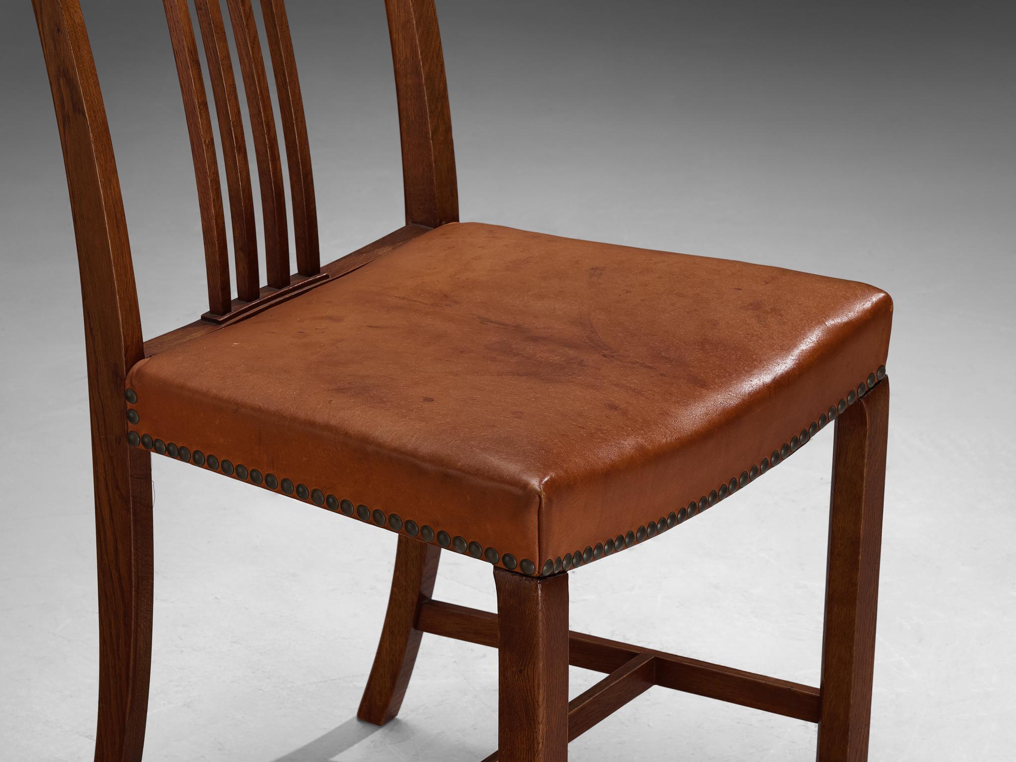 Jørgen Christensens Set of Eight Dining Chairs in Cognac Leather and Oak