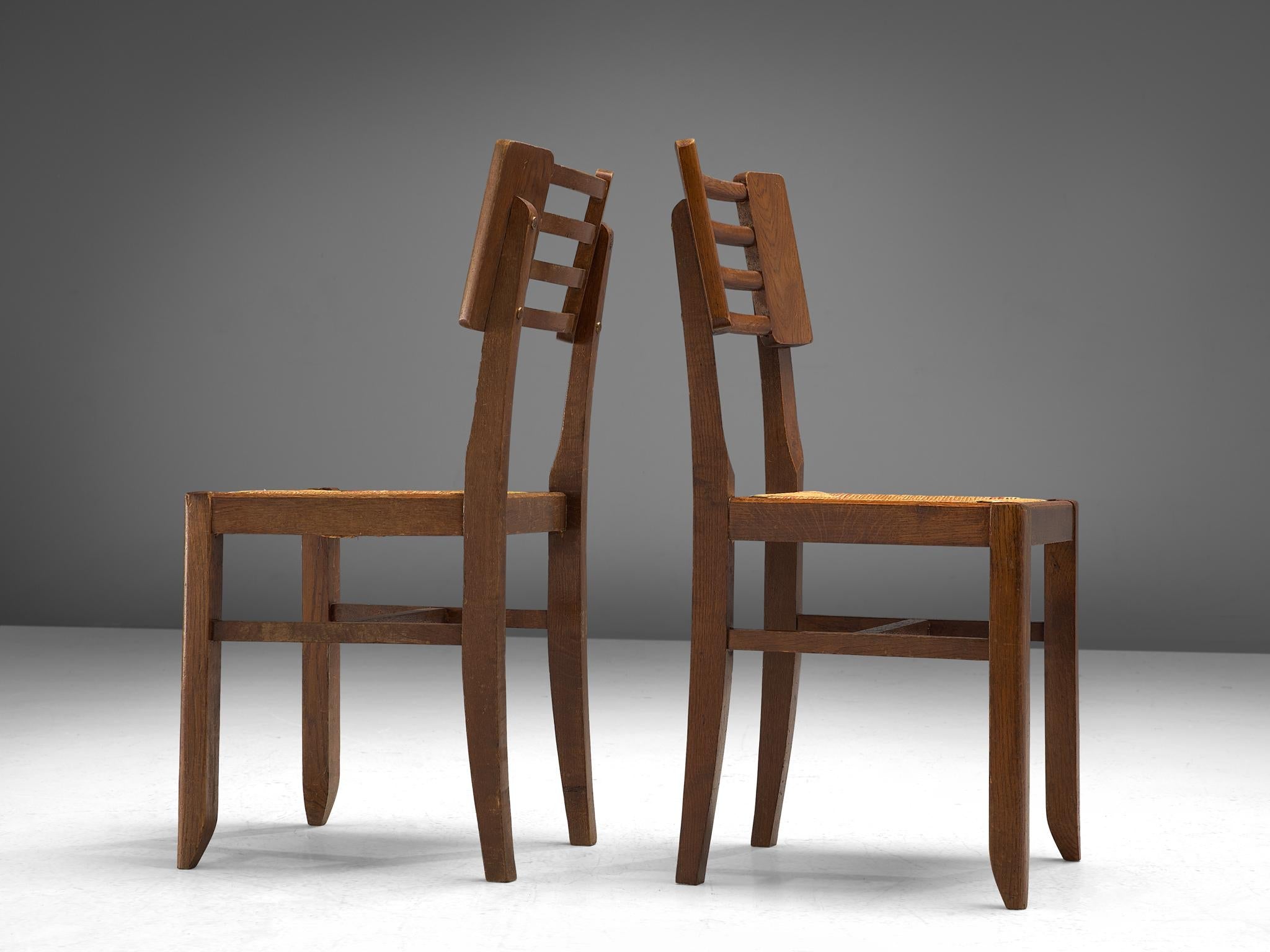 Pierre Cruège Pair of Dining Chairs in Oak and Straw