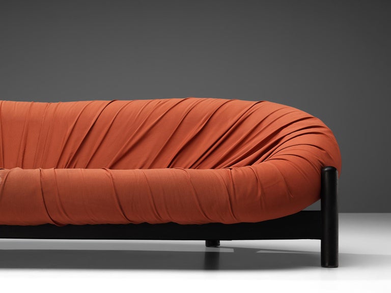 Round Brazilian Sofa in Red Upholstery and Black Wooden Frame