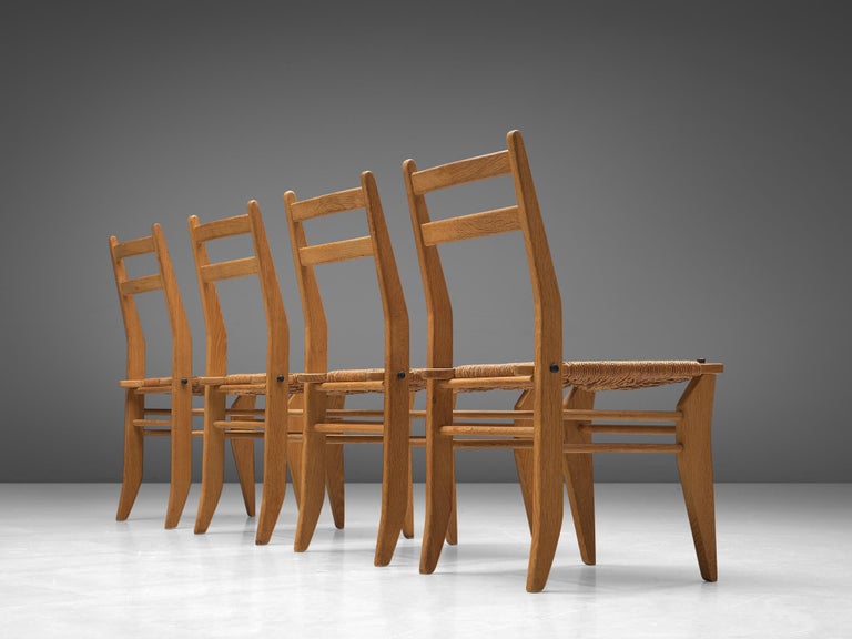 Guillerme & Chambron Set of Four Dining Chairs in Oak with Rush Seats