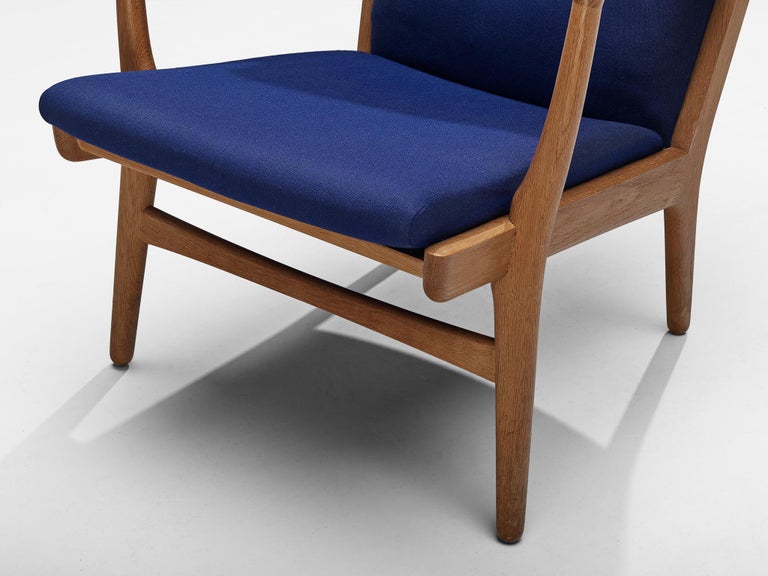 Hans J. Wegner Pair of Easy Chairs in Blue Upholstery and Oak