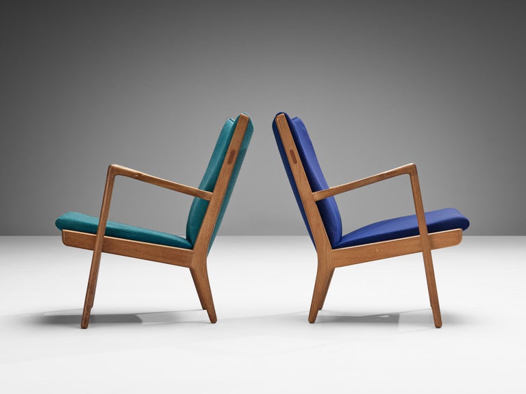 Hans J. Wegner Pair of Easy Chairs in Blue Upholstery and Oak