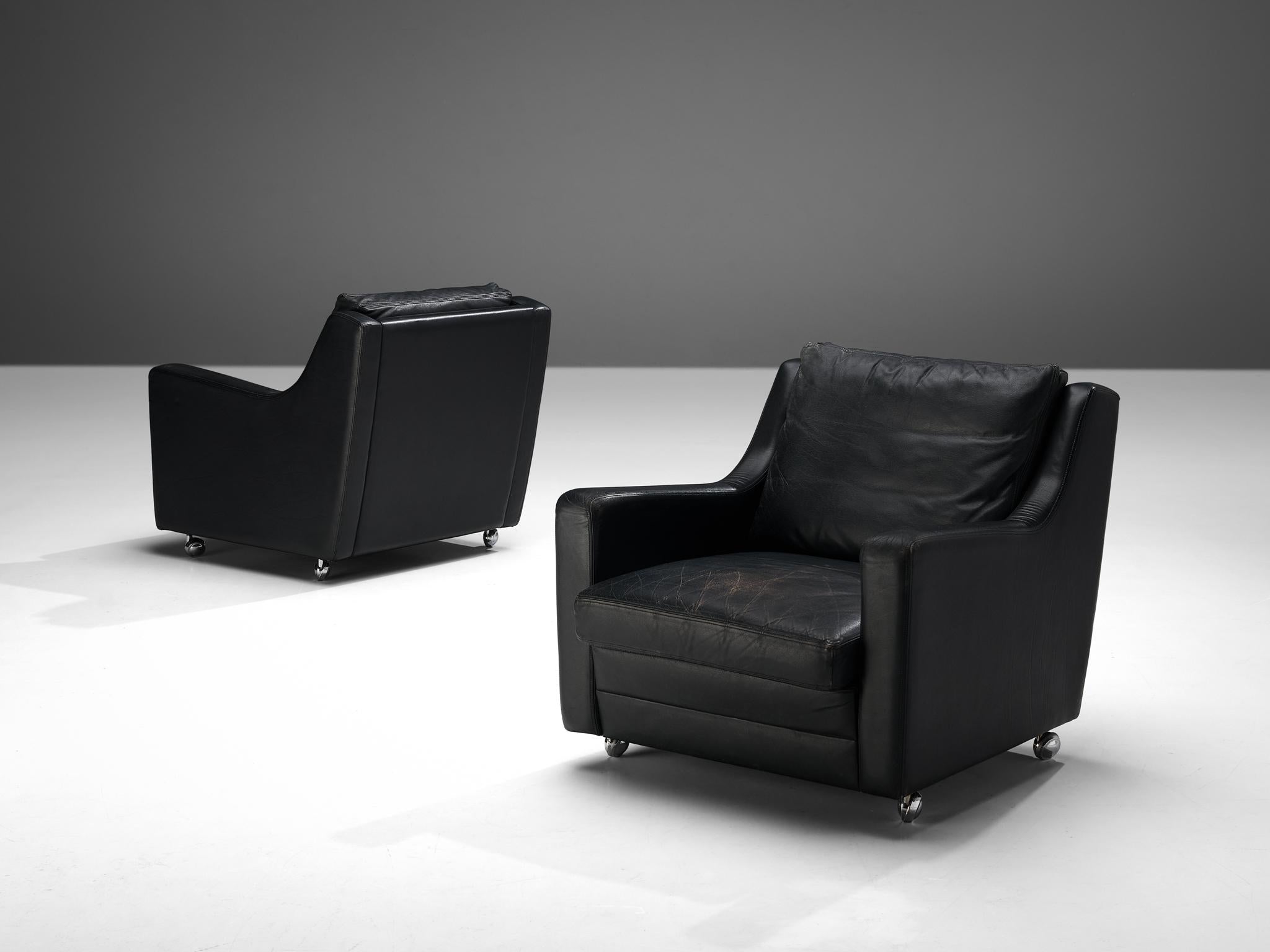 Streamlined Modern Pair of Lounge Chairs in Black Leather