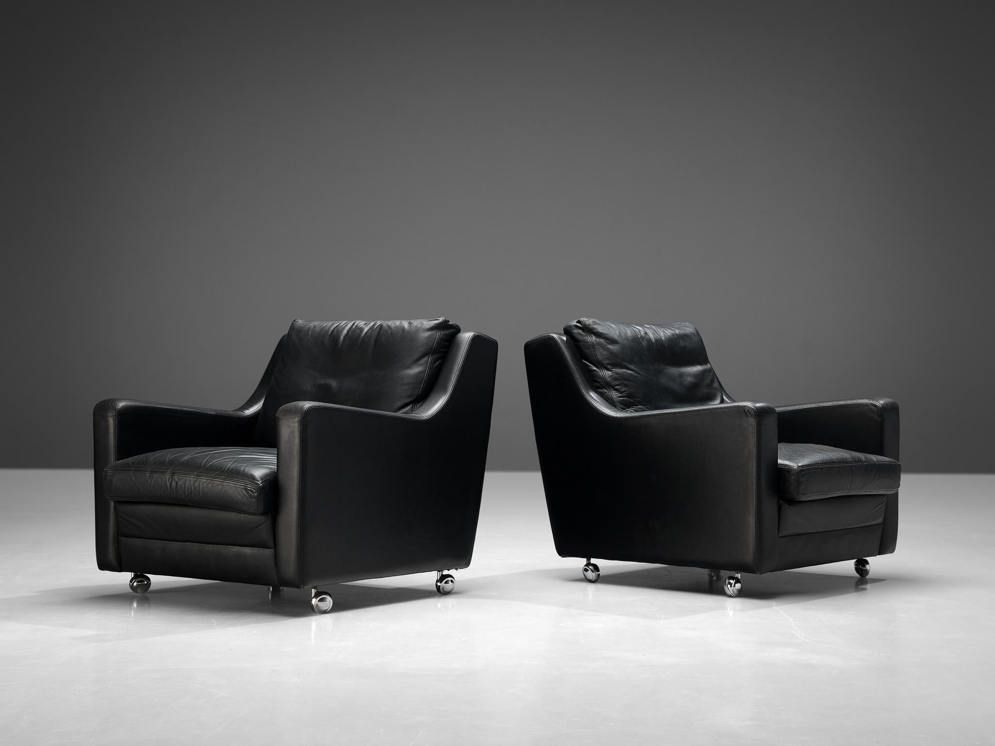 Streamlined Modern Pair of Lounge Chairs in Black Leather