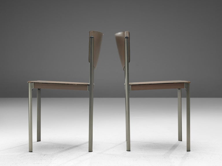 Matteo Grassi Set of Ten Dining Chairs in Leather and Steel