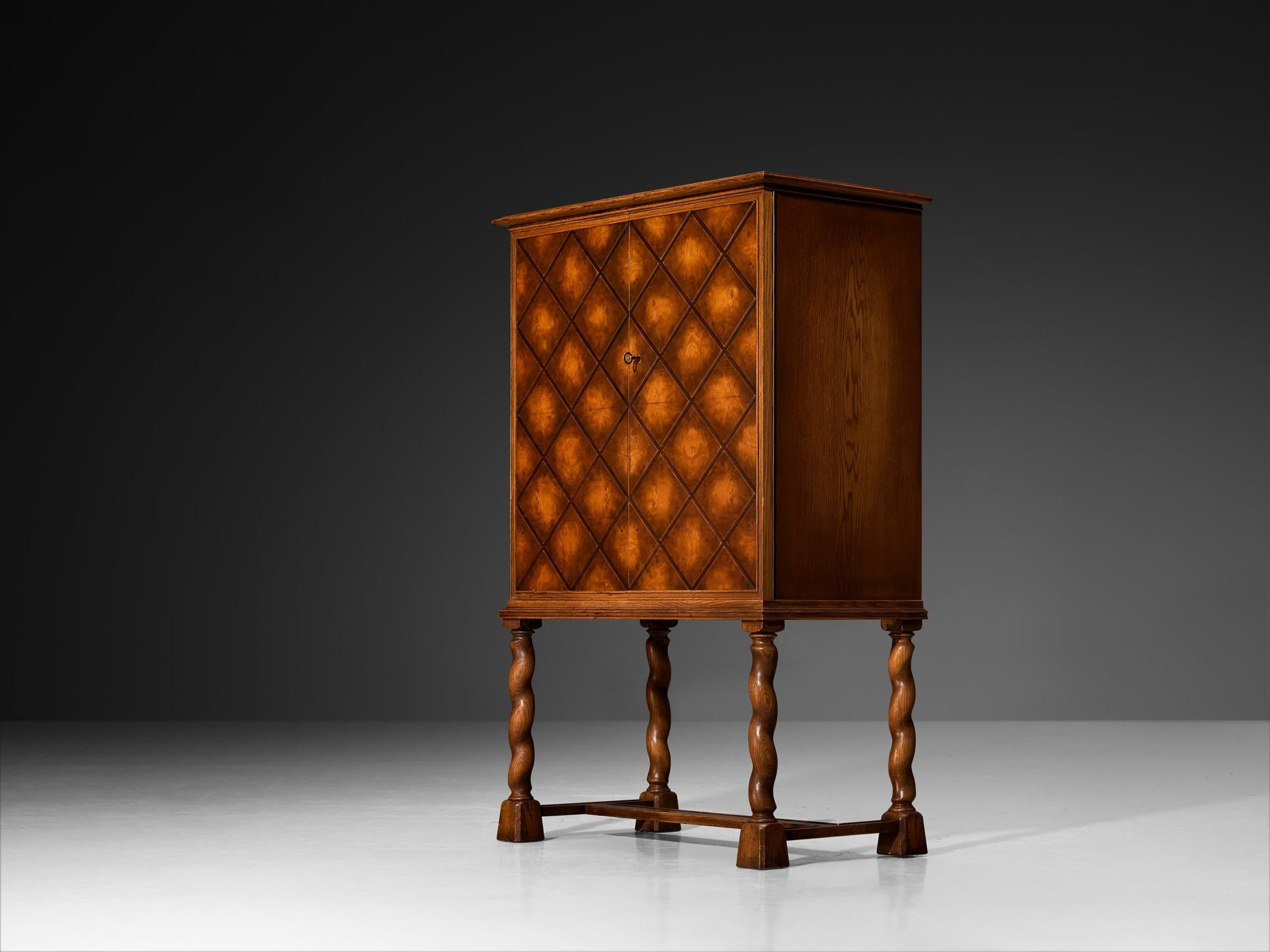 Swedish Art Deco High-Legged Cabinet with Carved Doors in Oak