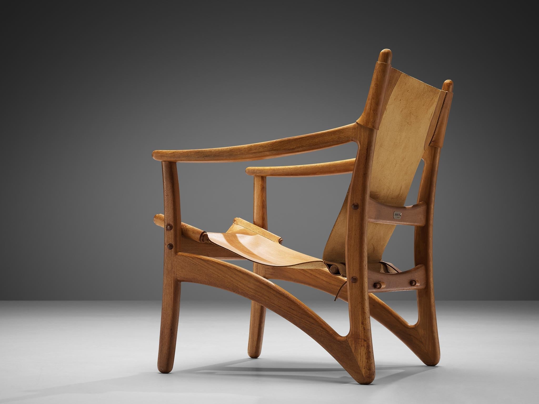 Danish Mid-Century Modern Lounge Chair in Teak and Cognac Leather