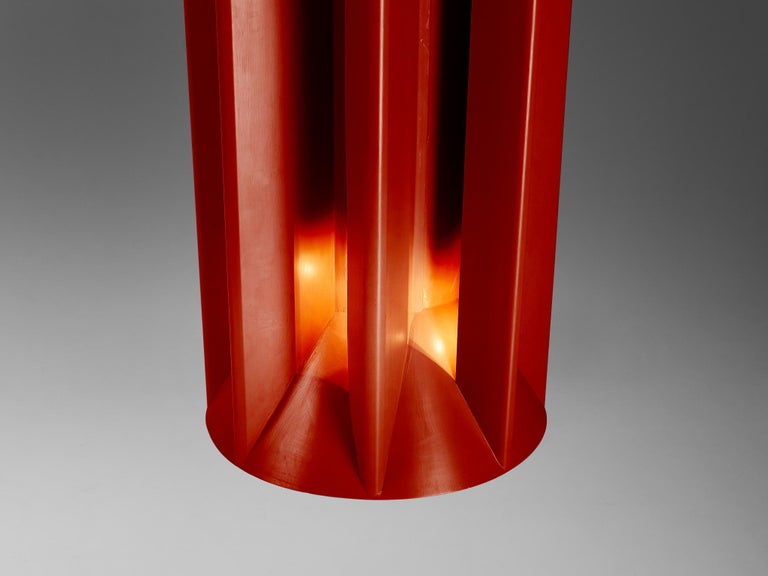 Sculptural Chimney in Burgundy Red Steel with Integrated Lights