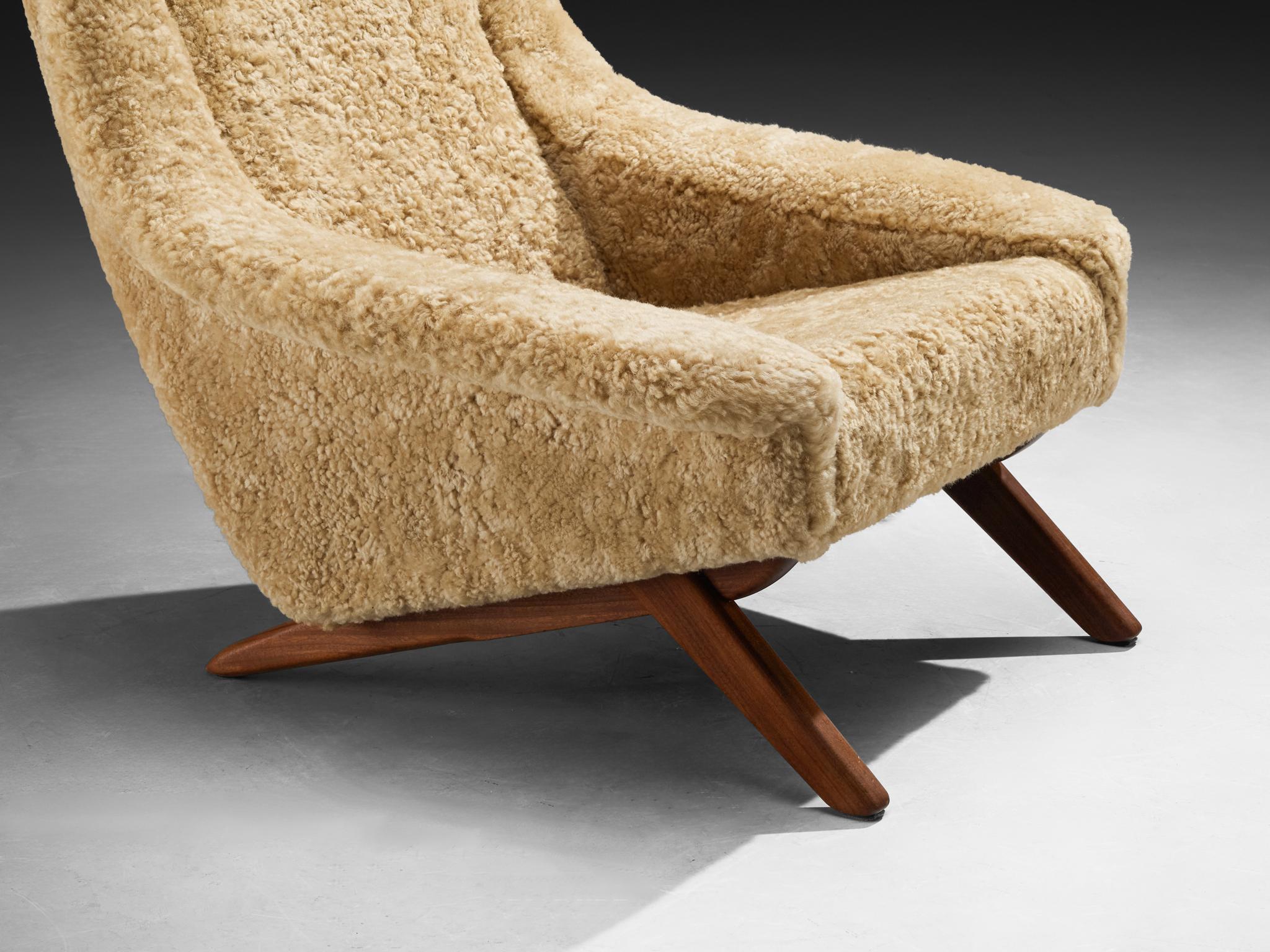 Illum Wikkelsø 'Ox' Easy Chair in Beige Sheepskin and Teak