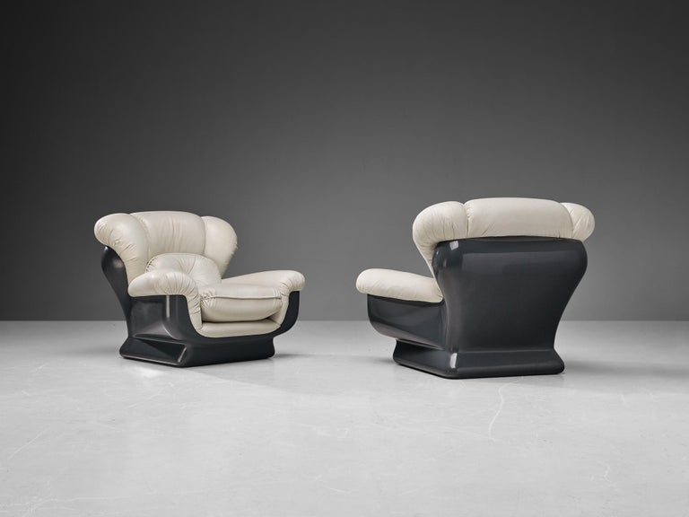 Italian Bulky Pair of Lounge Chairs in Fiberglass and Leatherette