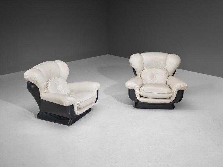 Italian Bulky Pair of Lounge Chairs in Fiberglass and Leatherette