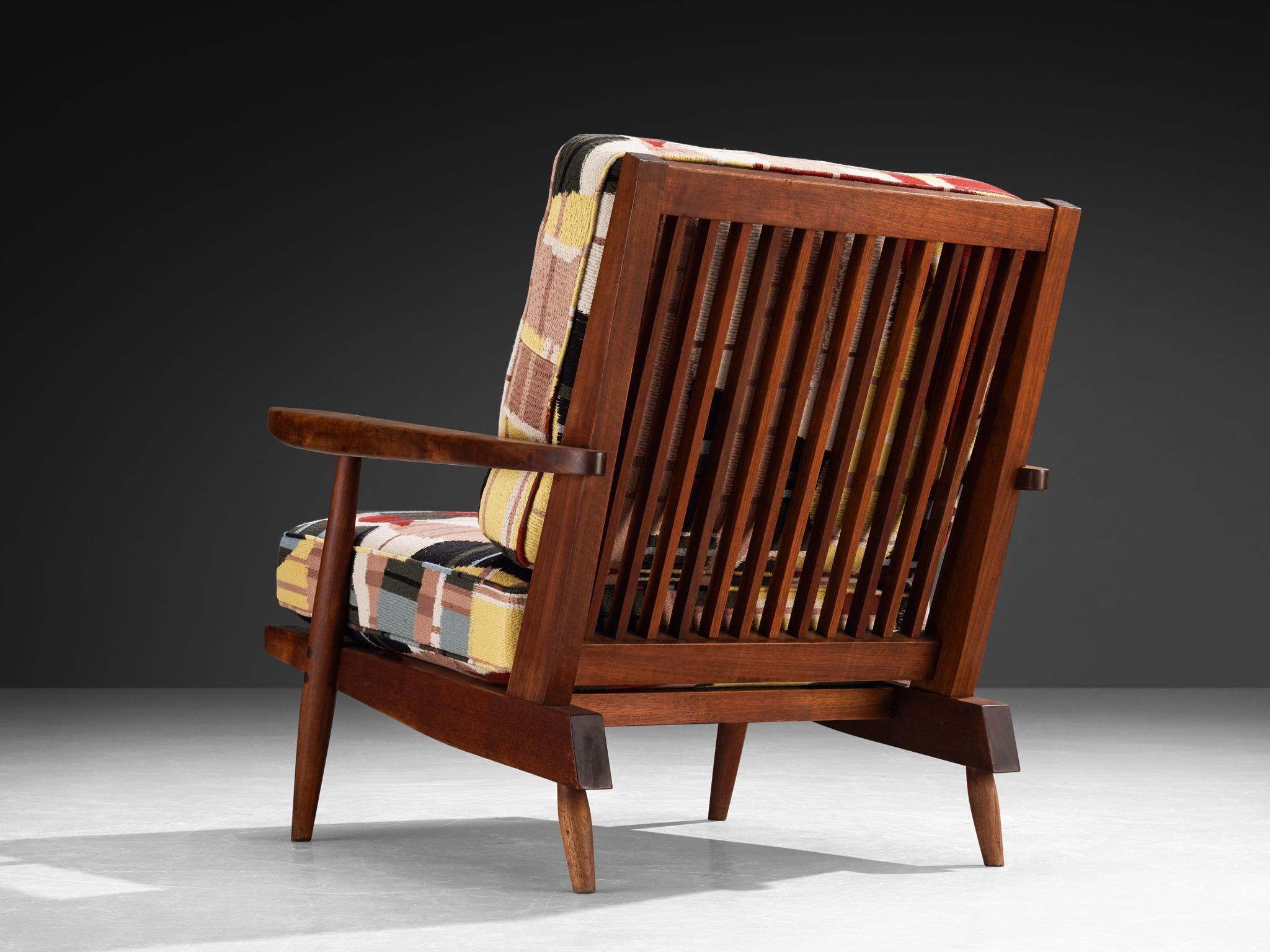 George Nakashima 'Cushion' Spindleback Lounge Chair and Ottoman in Walnut