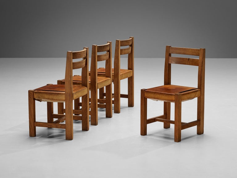 Atelier C. Demoyen Set of Four Dining Chairs in Solid Elm and Cognac Leather