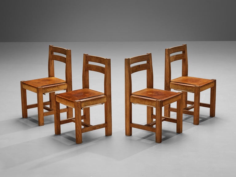 Atelier C. Demoyen Set of Four Dining Chairs in Solid Elm and Cognac Leather