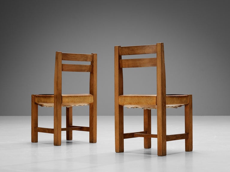 Atelier C. Demoyen Set of Four Dining Chairs in Solid Elm and Cognac Leather