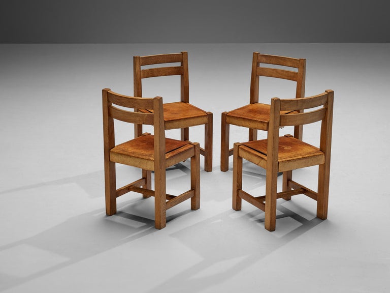 Atelier C. Demoyen Set of Four Dining Chairs in Solid Elm and Cognac Leather