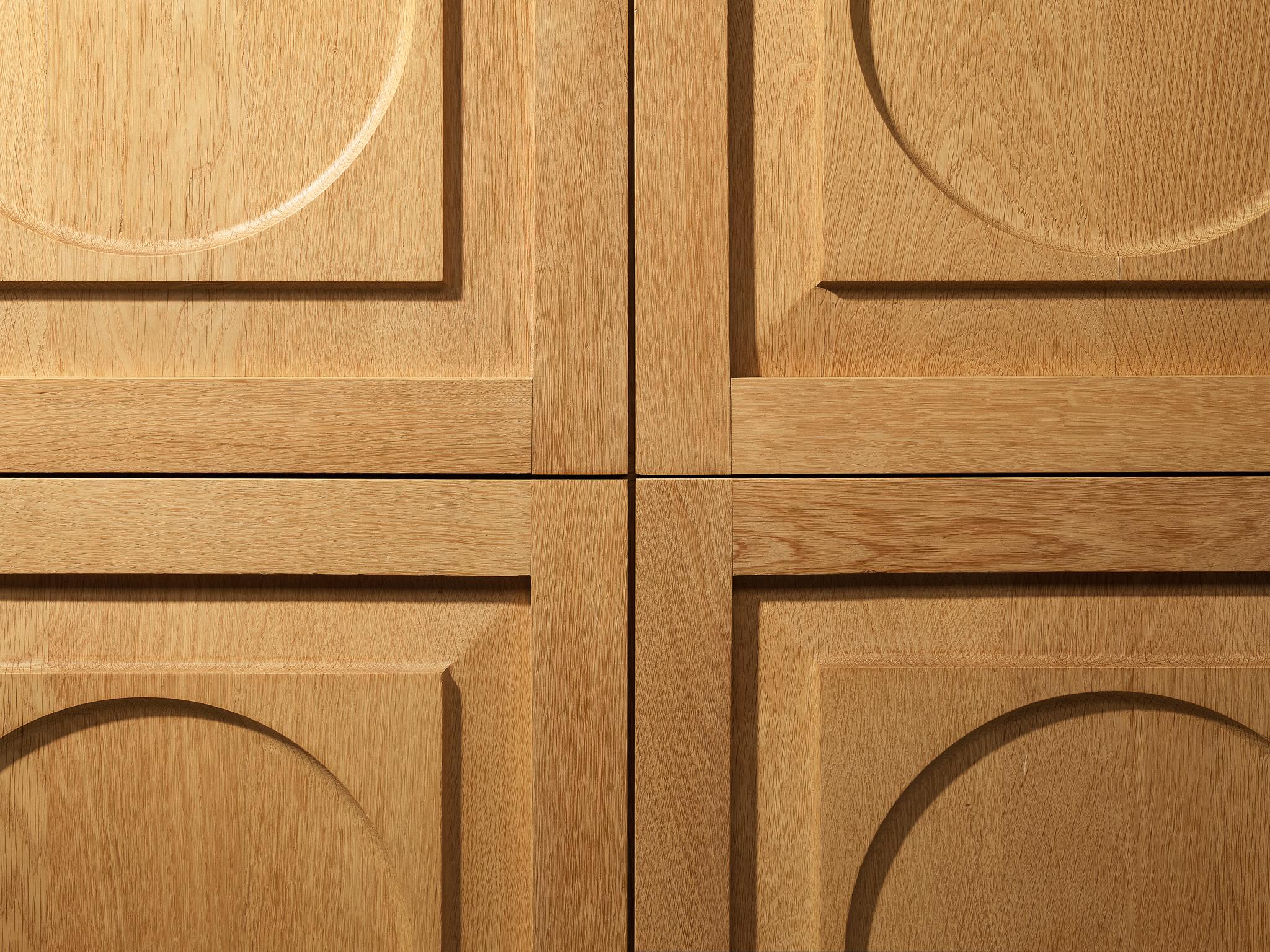 Modern Cabinet with Circular Carvings in Blond Oak