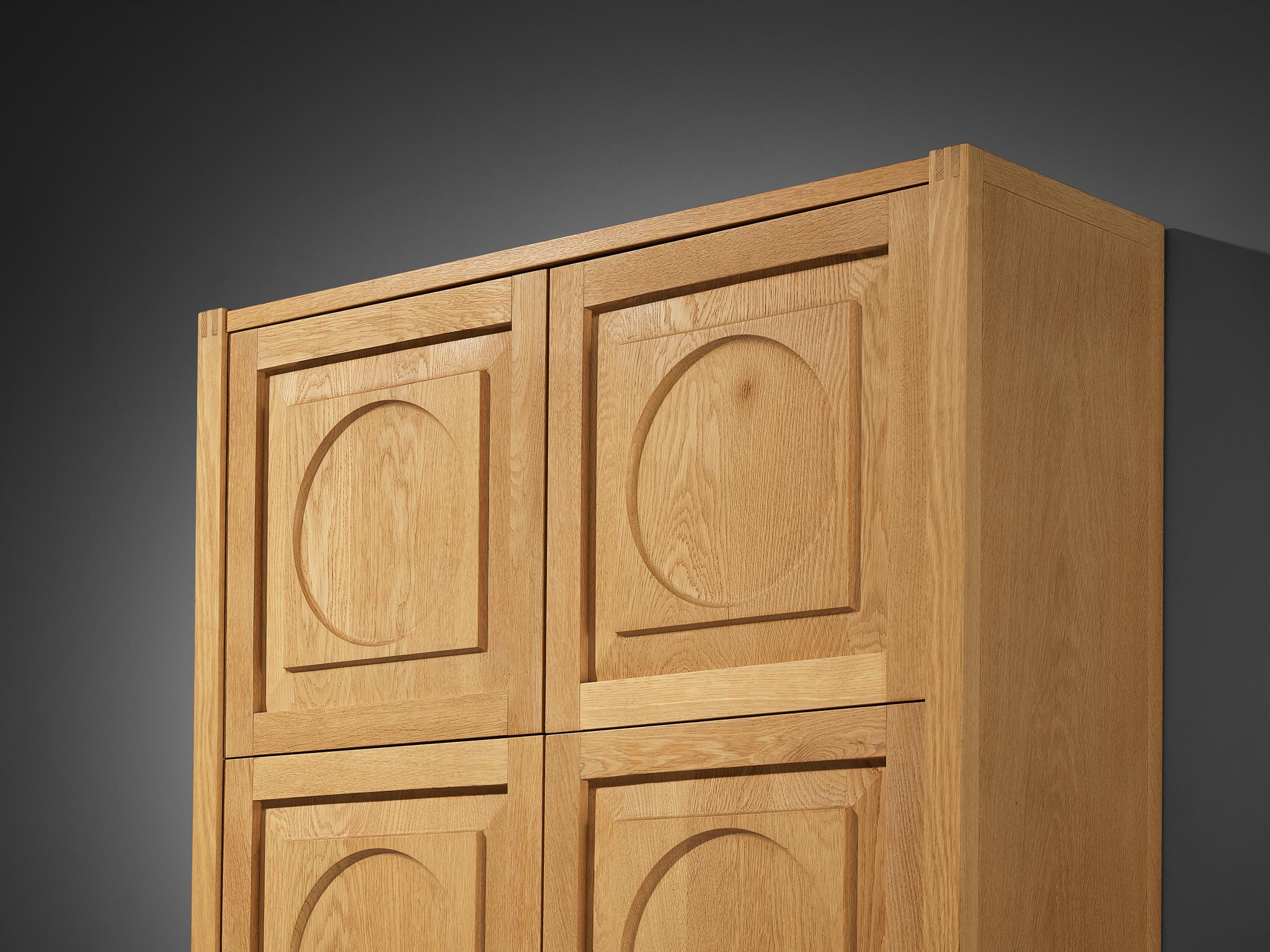 Modern Cabinet with Circular Carvings in Blond Oak