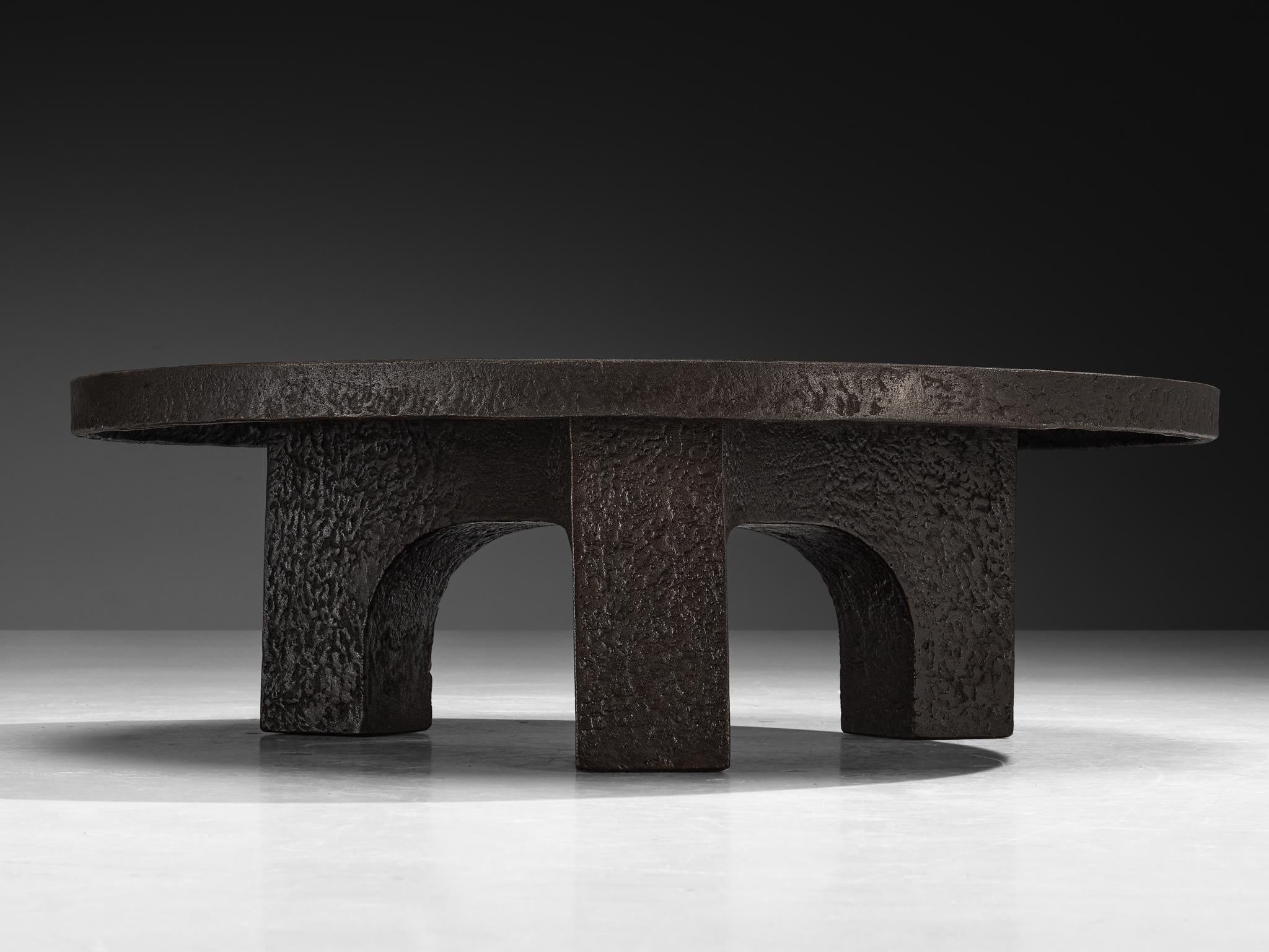 Brutalist Round Coffee Table in Dark Brown Stone Look