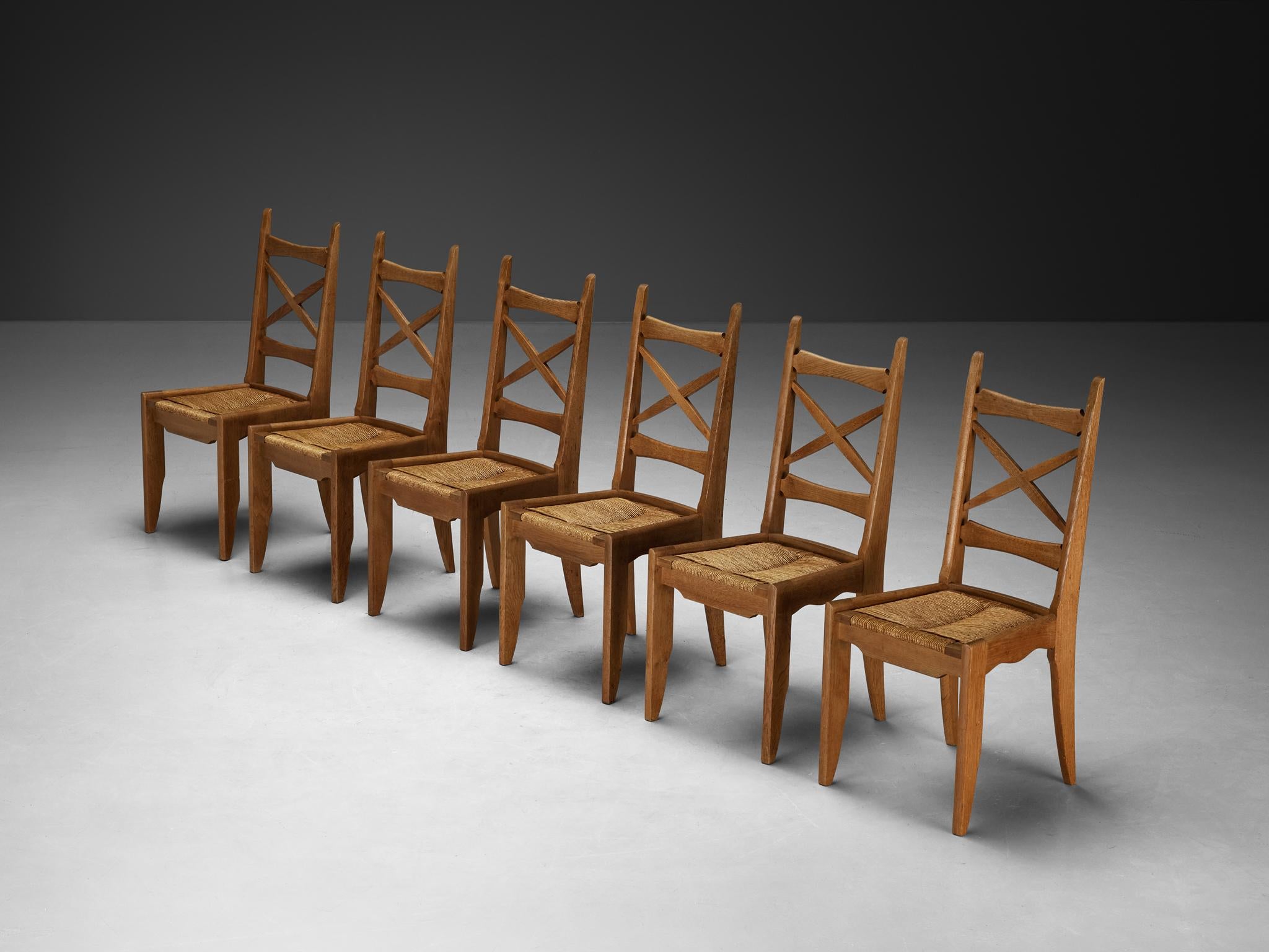 Guillerme & Chambron Set of Six Dining Chairs in Oak and Straw