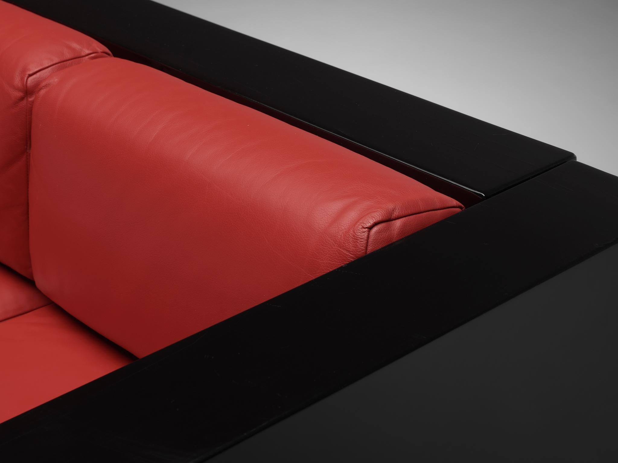 Red black leather deals sofa