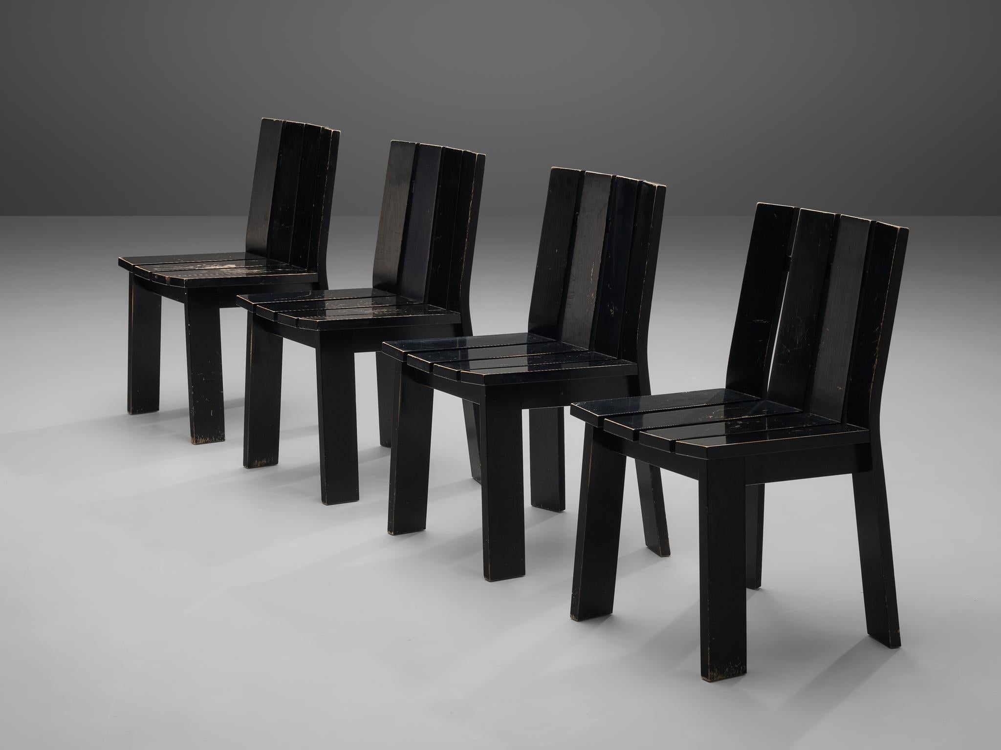 Set of four store black dining chairs