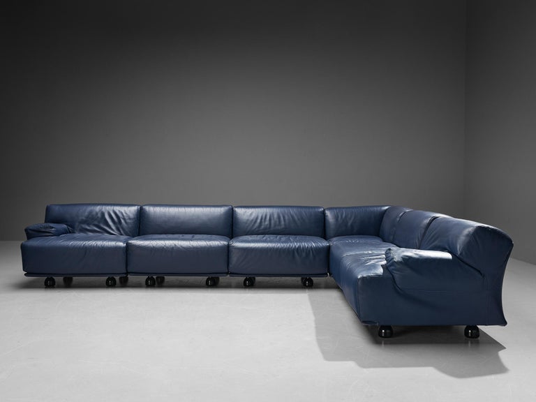 Gray leather deals sectional with ottoman